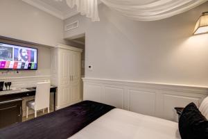 TV a/nebo společenská místnost v ubytování Hotel Tito