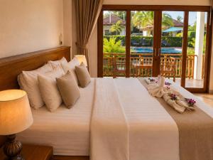 Katil atau katil-katil dalam bilik di Verona Lanta Resort +66 gambar
