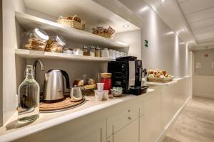 Kuchyň nebo kuchyňský kout v ubytování Hotel Tito