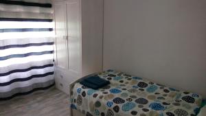 Postel nebo postele na pokoji v ubytování Apartments Tazacorte Beach 2-3 floor