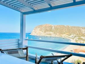 a view of the ocean from a balcony at Sul Mare Suite in Agia Kiriaki Beach