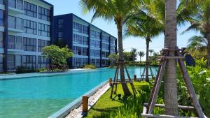 a view of a pool at a resort at Baan Thew Talay Blue Sapphire in Cha Am +22 photos