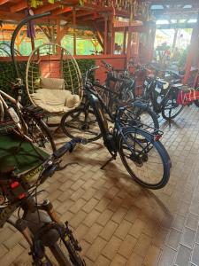 a bunch of bikes parked in a building at Park Hédervár in Hédervár