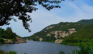 a view of a river with mountains in the background at Buan Mul Love Pension in Buan +4 photos