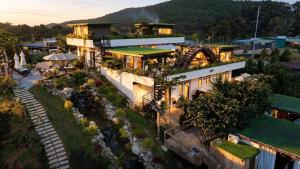 an overhead view of a building with a garden at Chanchill Glamping&cafe in Xuân Thọ