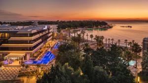 an aerial view of a resort with a pool at Liberty S Hotel in Novalja