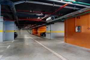 an empty parking lot in a parking garage at Vrtovi Boke by Montena in Dobrota +101 photos