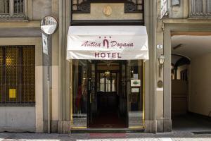 an entrance to a hotel with a white awning at Hotel Antica Dogana in Turin