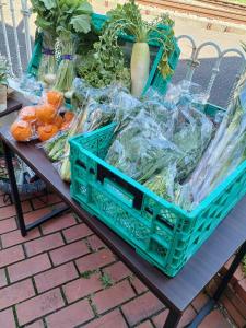 a basket of vegetables sitting on a table at ホワイトホテル鎌倉 in Kamakura +16 photos