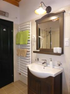 Koupelna v ubytování Tündérgyöngye Apartmanház + 37 fotografií