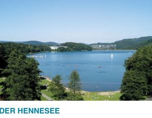a view of a large lake with boats in it at Fernblick Oase in Meschede