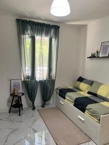 a bedroom with a bed and a window at Leonardo Loft in Filettino