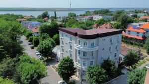 an overhead view of a building in a city at Vila Randunica in Eforie Sud