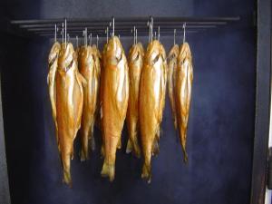 a bunch of fish hanging on a rack at Haus-Johanna in Riedlhütte