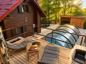 an overhead view of a deck with a water slide at Kuća za odmor Cozy Bear Cabin in Brestova Draga