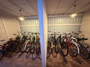 a bunch of bikes parked in a garage at Reda in Rowy
