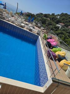 a swimming pool on the deck of a cruise ship at Apartments Mekic in Utjeha +35 photos