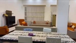 a living room with a table and a couch at Sulav amedi in Sūlav