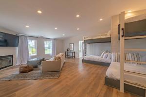 a bedroom with a bunk bed and a living room at Hilltop Oasis in Templeton +108 photos