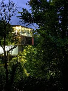 a building with trees in front of it at Golden Horizon in Ts'ikhisdziri