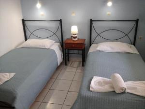 Postel nebo postele na pokoji v ubytování Grande Murano