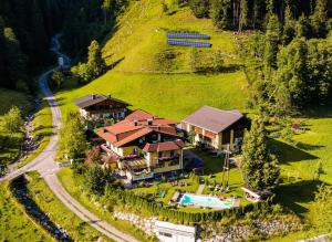 an aerial view of a house on a hill at Schattaugut in Eben im Pongau