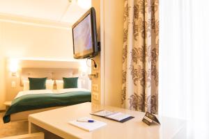 Postel nebo postele na pokoji v ubytování Hermes Hotel Oldenburg
