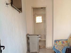 a bathroom with a sink and a mirror in a room at Casa Catarina in São Roque