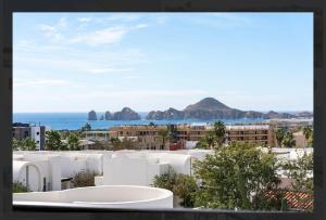 a view of the ocean from a building at Sunset view Penthouse 302 in Cabo San Lucas