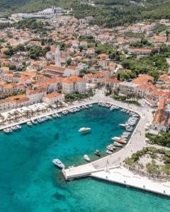 an aerial view of a harbor with boats in the water at Apartments Marino in Supetar