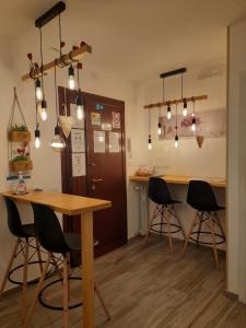 a dining room with a table and chairs at Il Mare Di Roma Luxury in Lido di Ostia +86 photos