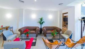 A seating area at Hospedium Hotel Cañitas Maite Gastronómico
