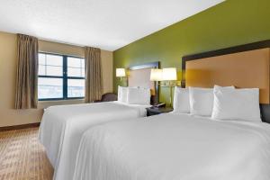 a hotel room with two beds and a window at Extended Stay America Suites - Frederick - Westview Dr in Frederick