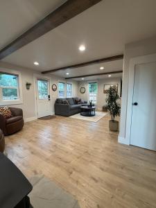 a living room with a couch and a table at Home Town Mountain Lodging 2 in Darby
