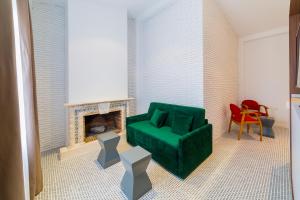 A seating area at Hospedium Hotel Cañitas Maite Gastronómico