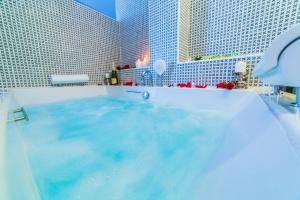 The swimming pool at or close to Hospedium Hotel Cañitas Maite Gastronómico