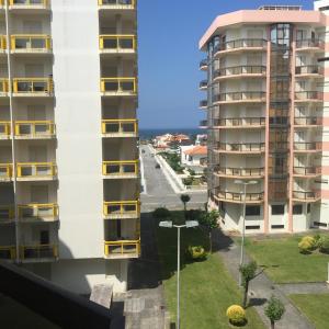 a view from the balcony of a apartment building at Apartamento Praia da Amorosa in Viana do Castelo