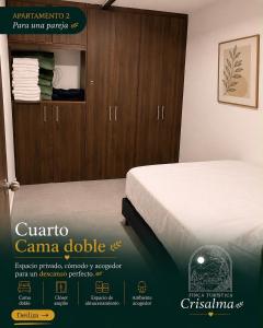 a poster of a bedroom with a bed and a cabinet at crisalma 1 in La Tebaida