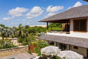 an image of a house with a view of the desert at Villa Florens in Jericoacoara
