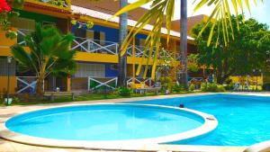 A piscina localizada em Pousada Recanto do Sossego ou nos arredores