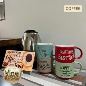 a group of coffee mugs sitting on top of a counter at Vine Residences Staycation in Manila