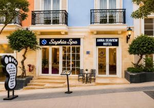 a store with a sign in front of a building at Anna seaview hotel in Phú Quốc +18 photos