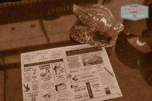 a paper with drawings on it on a table at Privada Lodge - Historic Hotel in Kratie