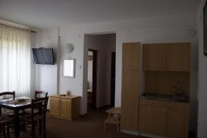 TV a/nebo společenská místnost v ubytování Apartments WinterSport