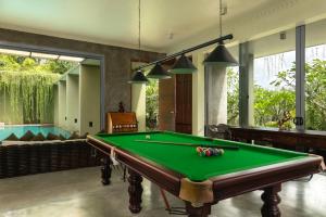 a billiard room with a pool table at Villa 98 in Malabe