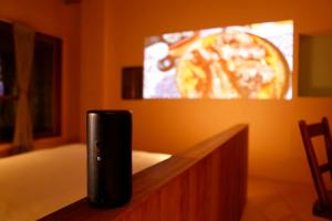a speaker sitting on top of a counter with a tv at たゆら in Nara +9 photos