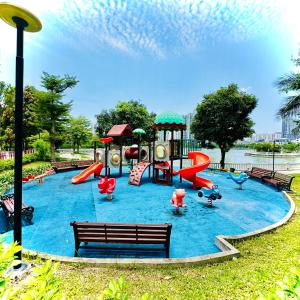 a water park with a playground with a slide at Cozy Skyline Escape 2Bedroom Near Hanoi Major Business District in Hanoi