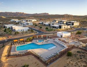 an aerial view of a resort with a swimming pool at LIONSBACK RESORT in Moab