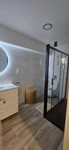 a bathroom with a mirror and a sink and a tub at Benning Haus Gandia in Gandía +30 photos