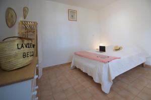 a room with a table with a candle on it at Sélection Camping La Croix -Valmer in La Croix-Valmer